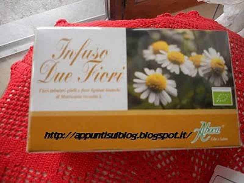 Daisy chamomile tea box with organic certification, bright floral packaging, natural herbal beverage, relaxing wellness tea, eco-friendly product for health-conscious consumers.