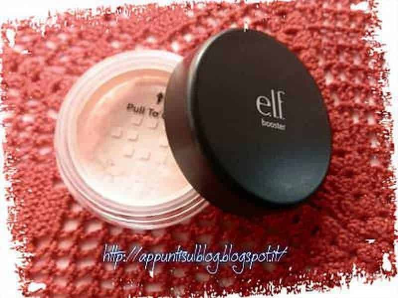 Crema viso elf cosmetics, contenitore aperto su sfondo rosa, prodotto di bellezza naturale, make-up e skincare, ideale per chi cerca qualità e efficacia nella cura della pelle.
