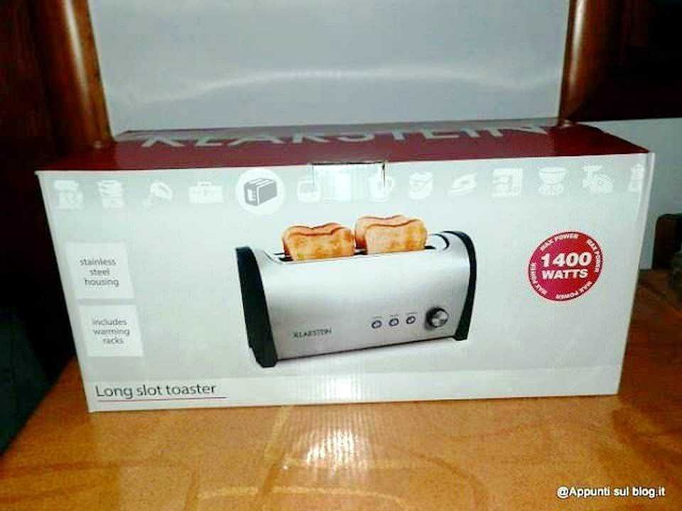 Fornetta lunga a fessura in acciaio inossidabile con braccio riscaldante per toast, potenza di 1400 watt, ideale per colazioni veloci e fuse da cucina, con design compatto e funzionalità pratiche.