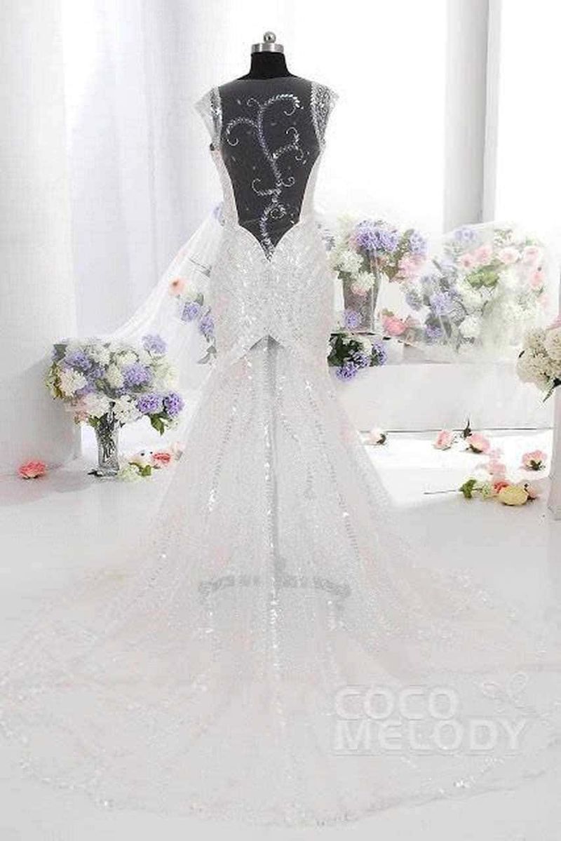 Abito da sposa in pizzo rosa con schiena scoperta