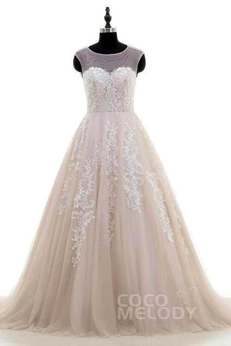 Abito da sposa con pizzo e dettagli ricamati