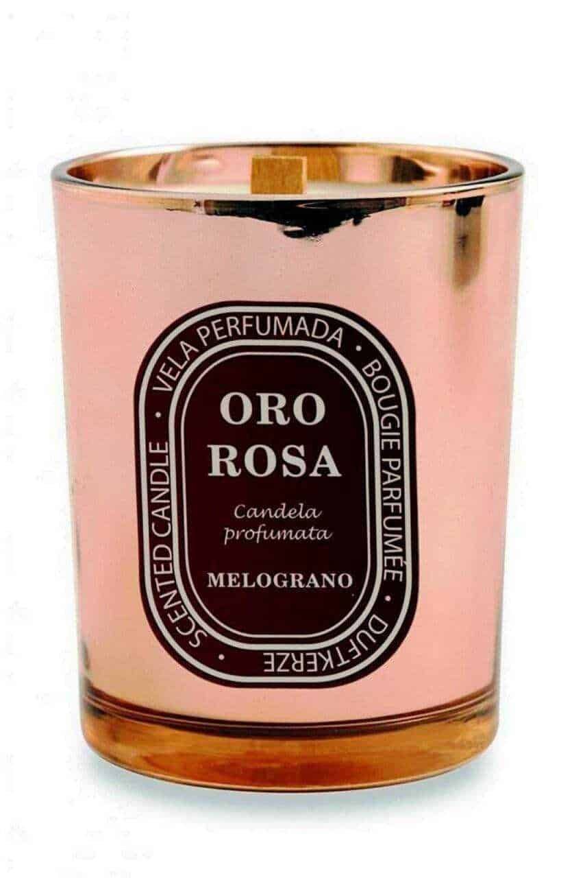 Candela profumata oro rosa, fragranza melograno, porta atmosfera elegante e avvolgente, ideale per creare ambienti raffinati e accoglienti, perfetta come decorazione e regalo di design.
