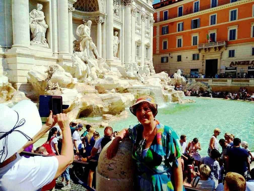 Fountain of the Four Rivers in Piazza Navona, Rome, Italy, featuring majestic baroque sculptures and the ancient Egyptian Obelisk of Domitian, set against the backdrop of the Church of Sant'Agnese in Agone.