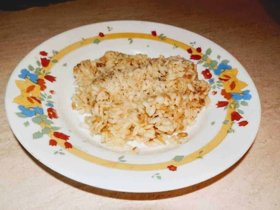 Riso con funghi . Elianto olio, sapori italiani per buongustai tradizionali