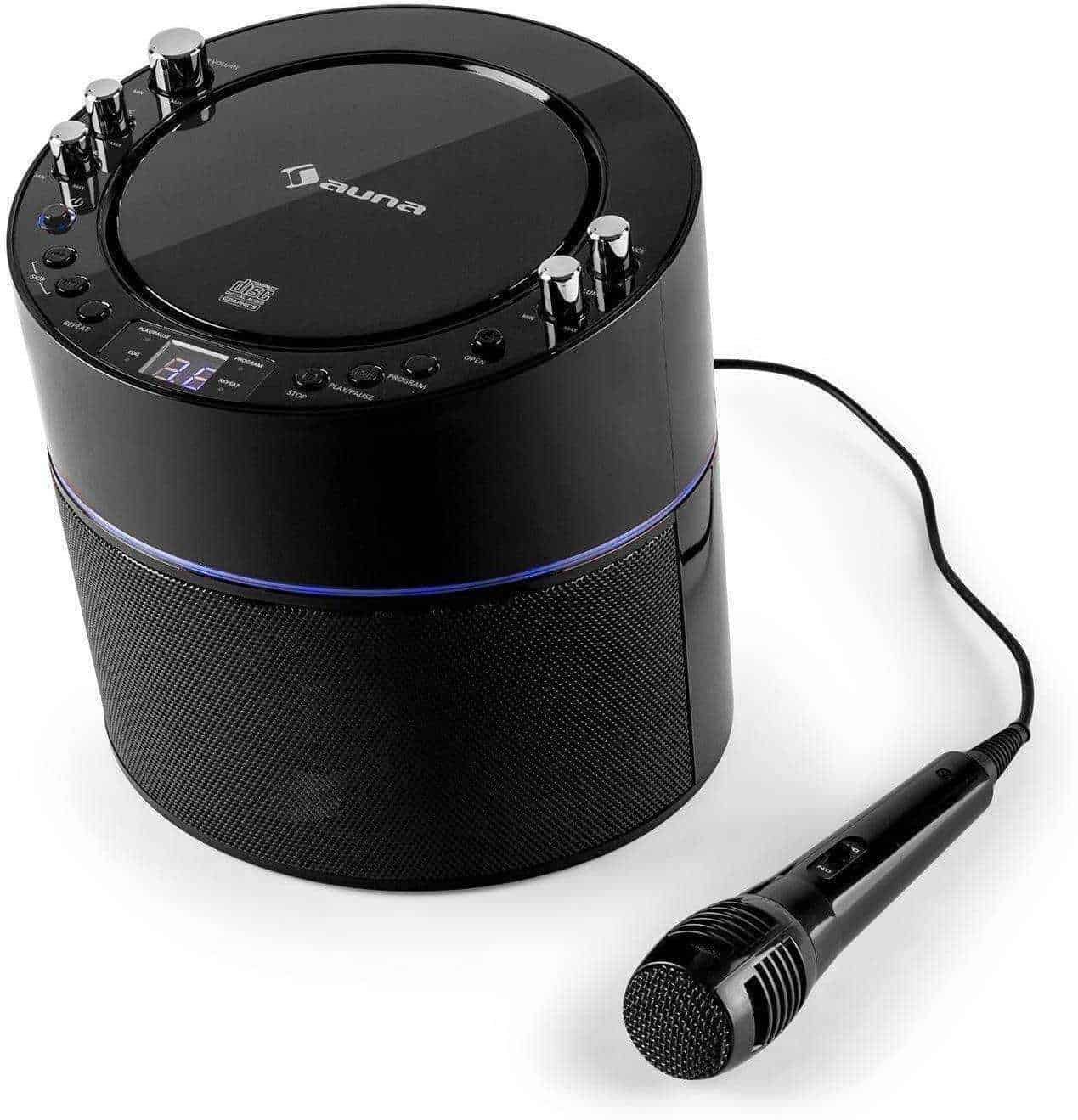 Altre testo alt: Altoparlante Bluetooth con funzione di microfono integrato, ideale per musica e karaoke, design nero elegante e compatto, perfetto per eventi e feste all'aperto e al chiuso.