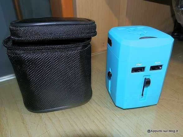 Cleaning device for electronic accessories and gadgets, compact and portable, in a black carrying case with blue portable washing machine.