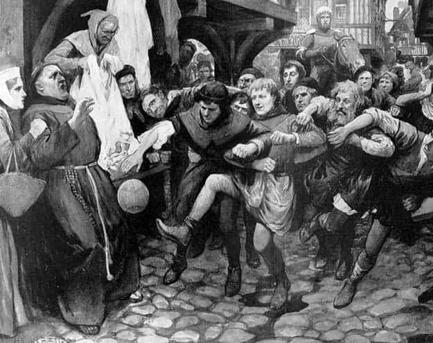 Scena di gioco medievale raffigurante il calcio medievale