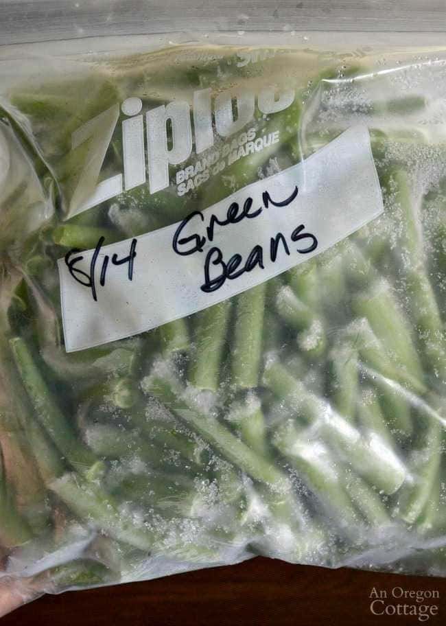 Green beans in plastic bag labeled 7/14 green beans, organic fresh vegetables for cooking or salads, high-quality green beans suitable for various recipes, farm-fresh produce from Oregon.