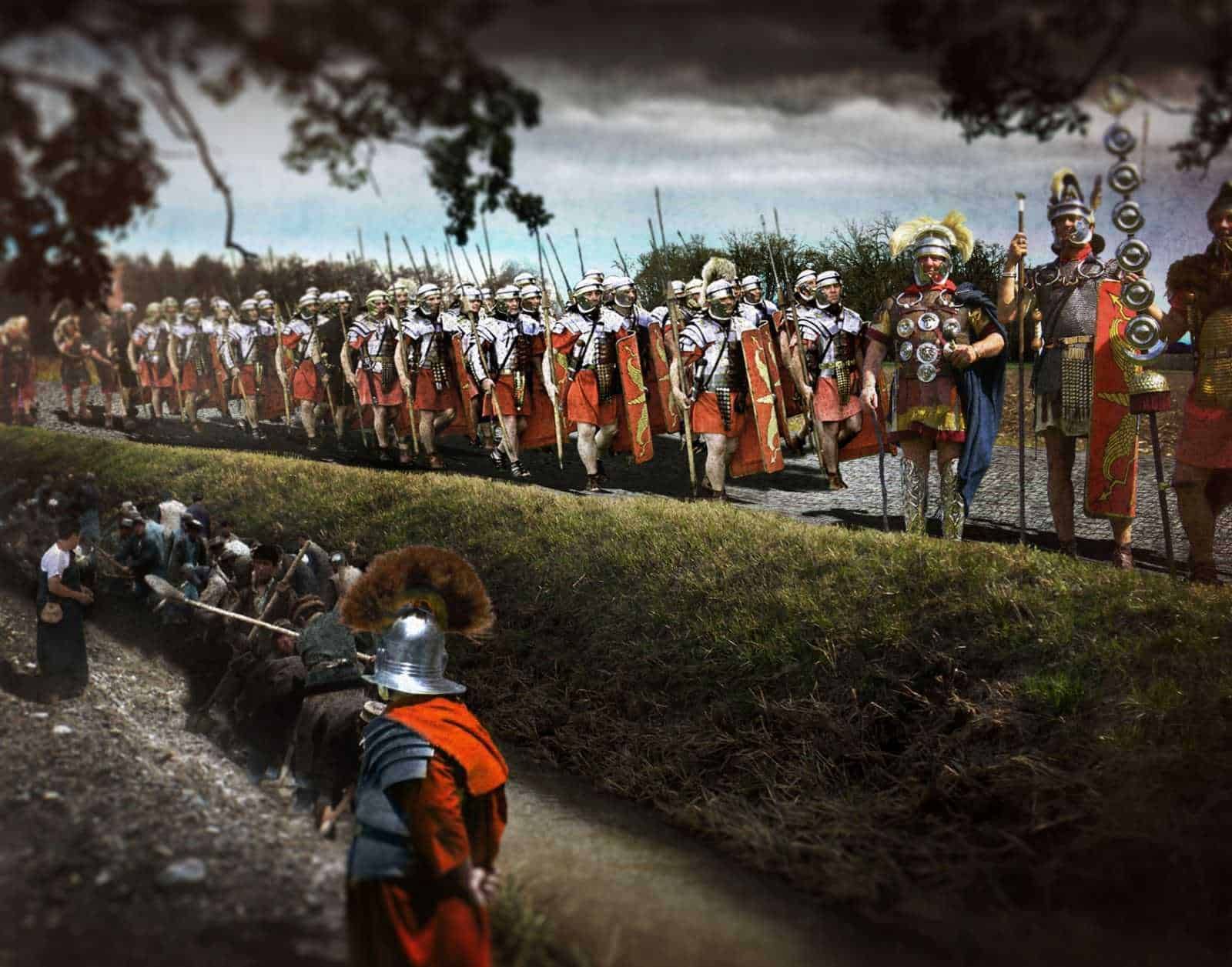 Esploratori romani in costume storico durante una rievocazione storica con soldati in armatura e uniformi antiche. Un evento culturale che ricrea scene di epoca romana con dettagli storici e costumi autentici.