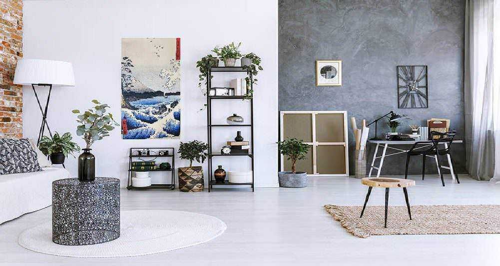 Decorare la parete del soggiorno: Interni moderni con soggiorno e zona studio, pareti grigie e arredi minimalisti; spazio elegante con piante, arte e dettagli di design, ideale per ispirare ambienti di lavoro e relax a casa.
