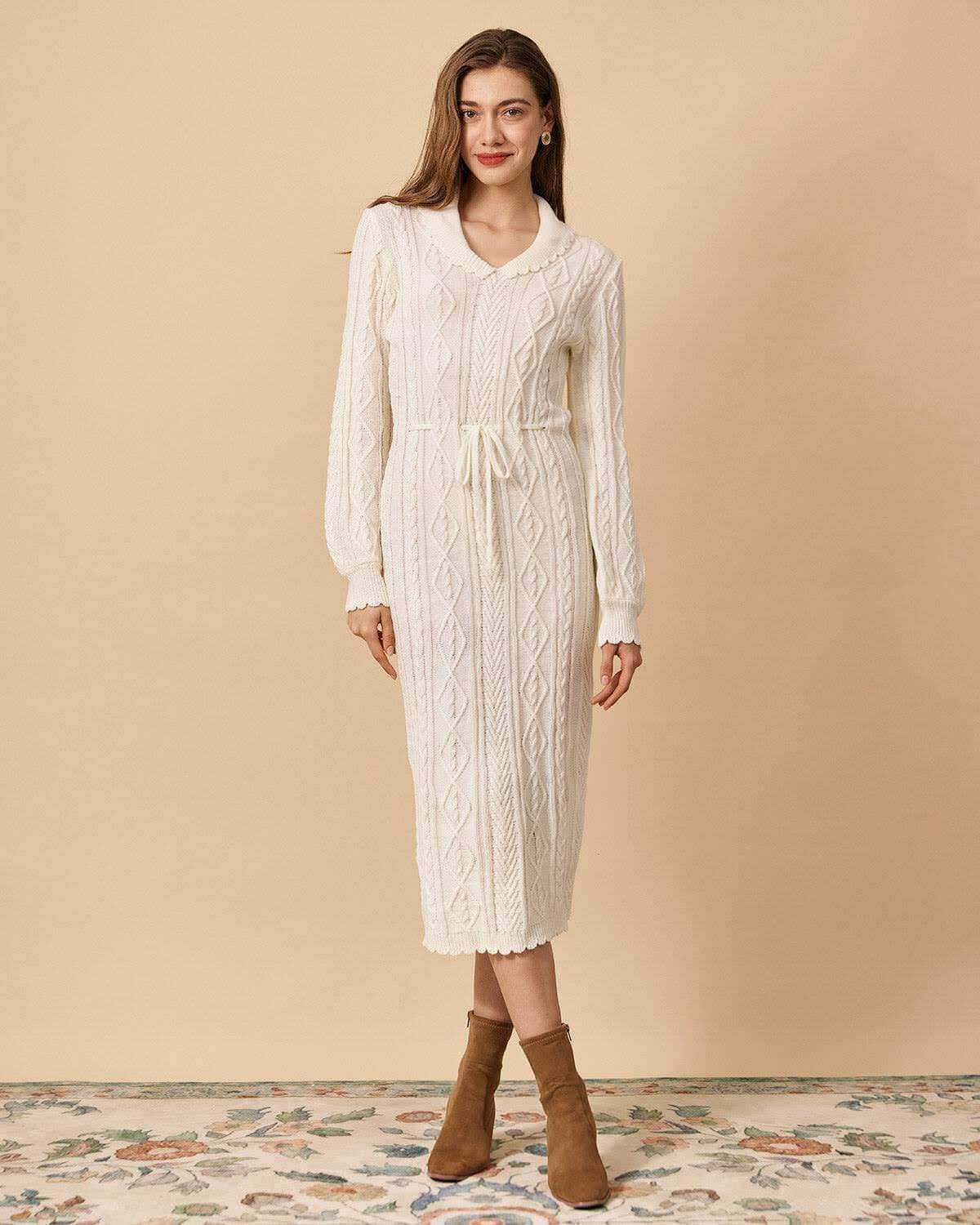 Elegante donna in morbido vestito lungo in maglia a trecce con cintura in vita, calzature stivaletti beige in a fondo beige, stile romantico e sofisticato, naturale e raffinato.