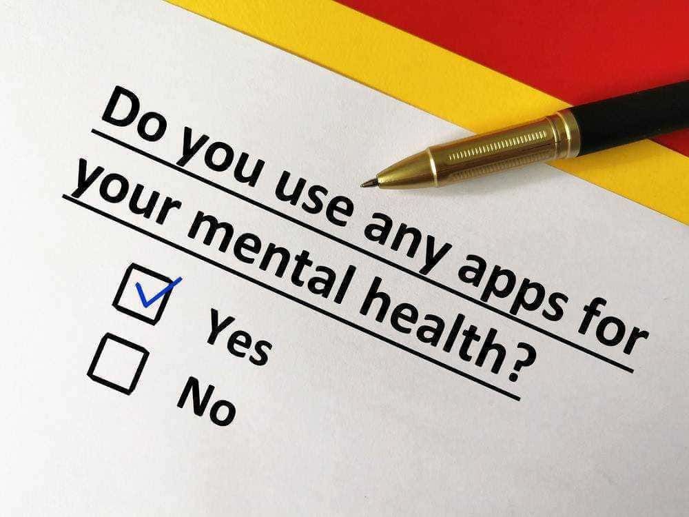 Appunti sul blog, domanda sulla salute mentale, penna e risposte, immagine con opzioni Yes o No, attenzione alla salute mentale, benessere psicologico.
