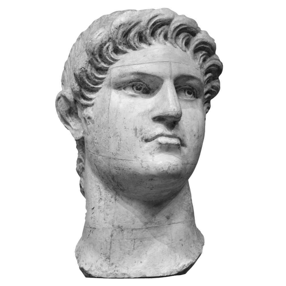 Antico busto di marmo di un giovane uomo, scultura classica, arte e storia dell'antica Grecia e Roma, simbolo di cultura e civiltà, perfetta per appunti sul blog dedicati all'arte antica.