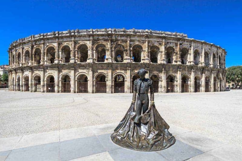 12 Stili Architettonici: quali sono e come riconoscerli (con esempi in Italia) 2 12 Stili Architettonici: Anfiteatro romano dell'antichità, esempio di stile architettonico antico, patrimonio UNESCO