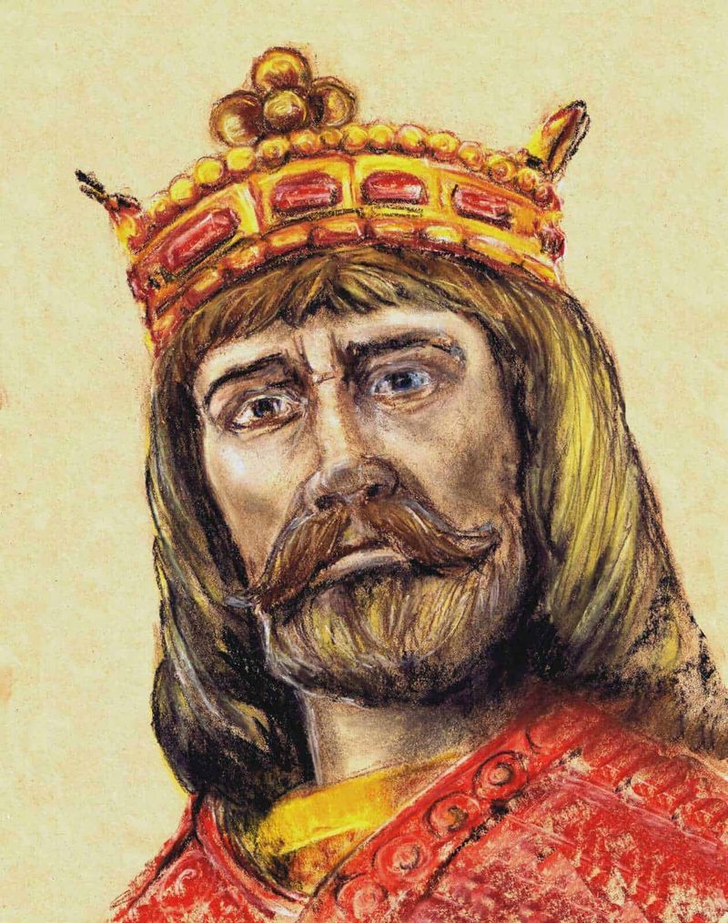 Carlomagno: ritratto ai Musei Vaticani, aspetto e vita quotidiana 4 Ritratto di un sovrano medievale con corona decorata, barba folta e abbigliamento regale, realizzato in stile pittorico per illustrare figure storiche e monarchiche italiane.