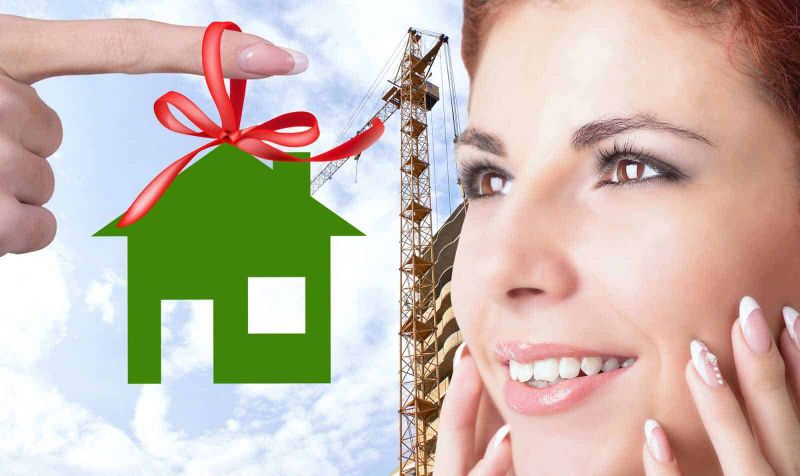 Cosa regalare a un amico che ha comprato casa: idee regalo candele profumate 3 Casa verde con fiocco rosso, simbolo di nuova abitazione o progetti edilizi.