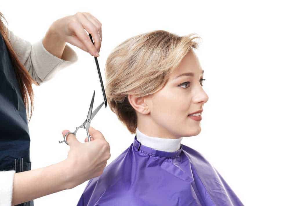 Fading-hairdress-salon-Italian-woman-having-hair-cut-appointment-haircare-clipper-tool-professional-hair-styling.