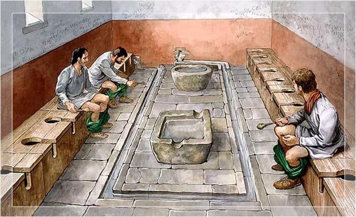 Lavabo storico romano con fontana e arredi in pietra, scene di vita antica in un ambiente ricostruito. Perfetto esempio di architettura e cultura romana antica, ideali per appunti sul blog su storia e patrimonio culturale.