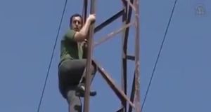 guy climbs high-voltage electric tower and gets electrocuted