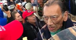 Nathan Phillips intimidates a high school student