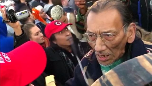 Nathan Phillips intimidates a high school student