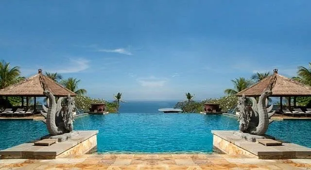 large infinity pool in front of ocean
