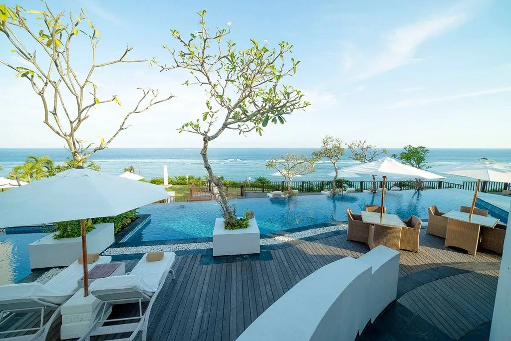 lounge furniture around infinity pool