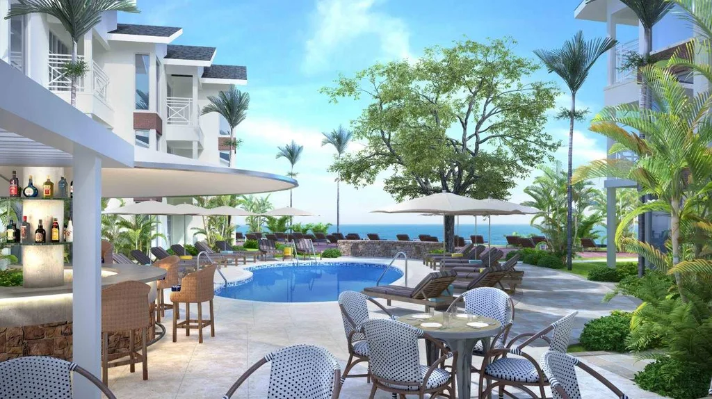 pool surrounded by chairs and tables at resort