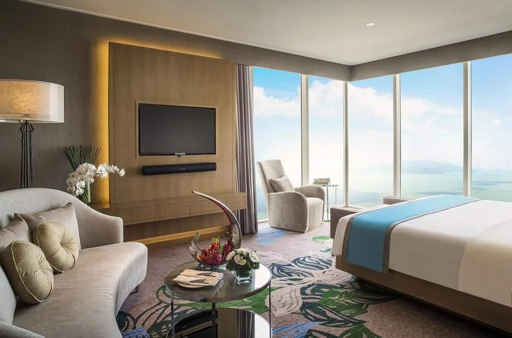 resort room with windows facing ocean