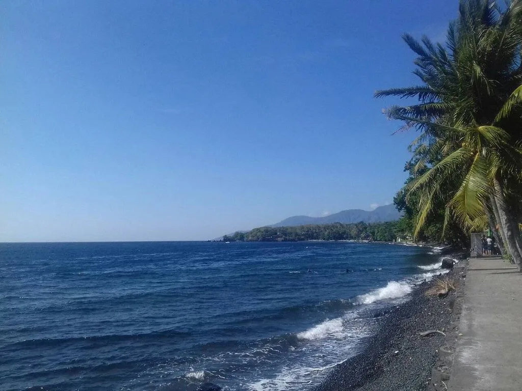 deserted beach with black sand