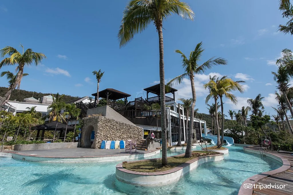 resort pool surrounded by lounge chairs