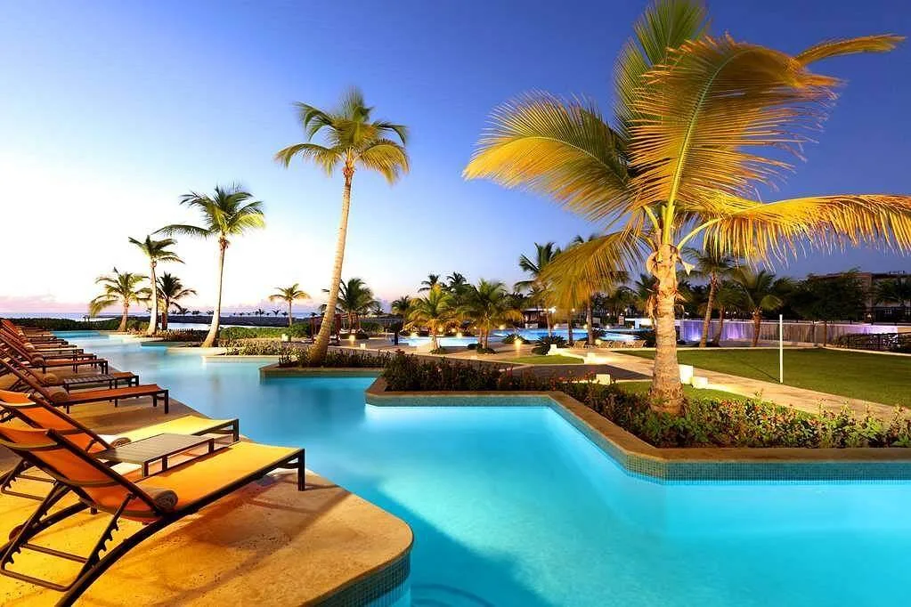 resort pool with palm trees