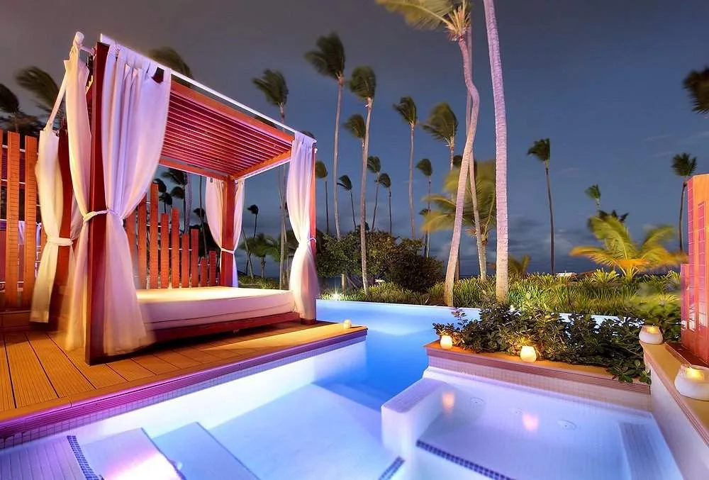 outdoor lounge bed next to private pool