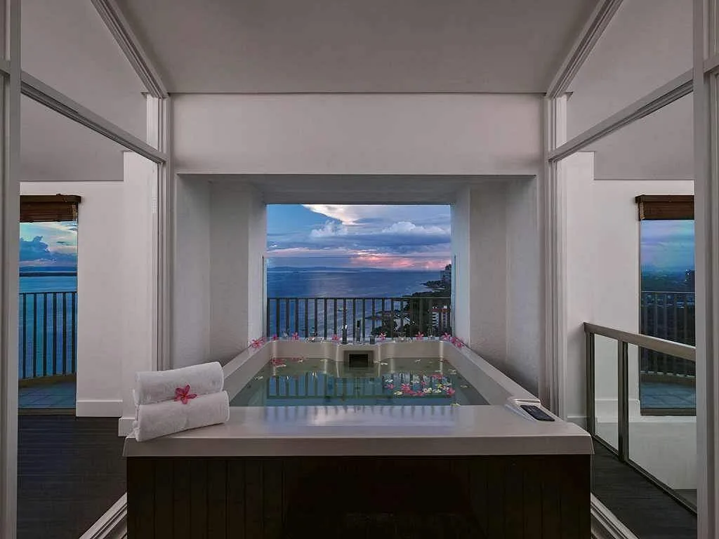 spa with window looking out onto ocean