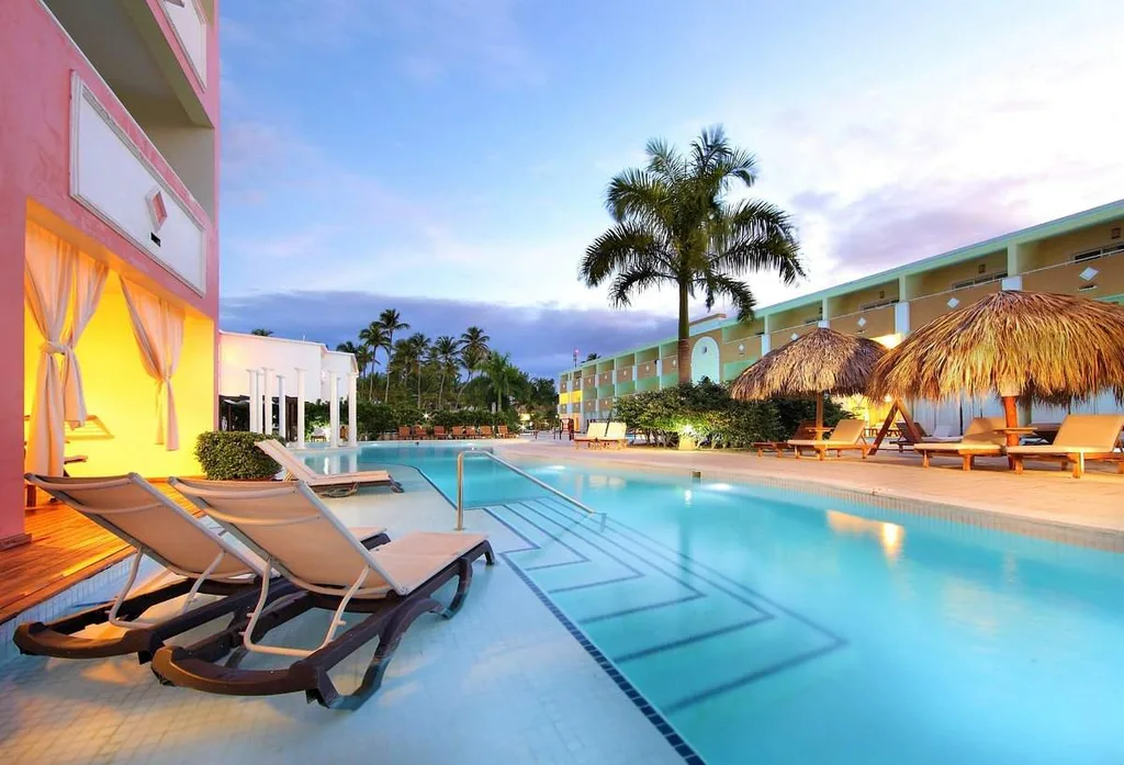 lounge chairs along side resort pool