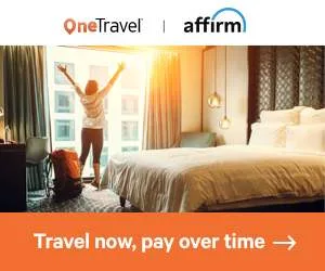 advertisement woman at window in hotel room