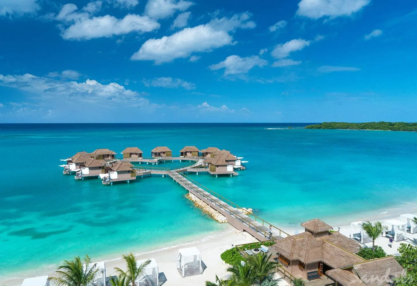 over-water bungalows in shape of heart