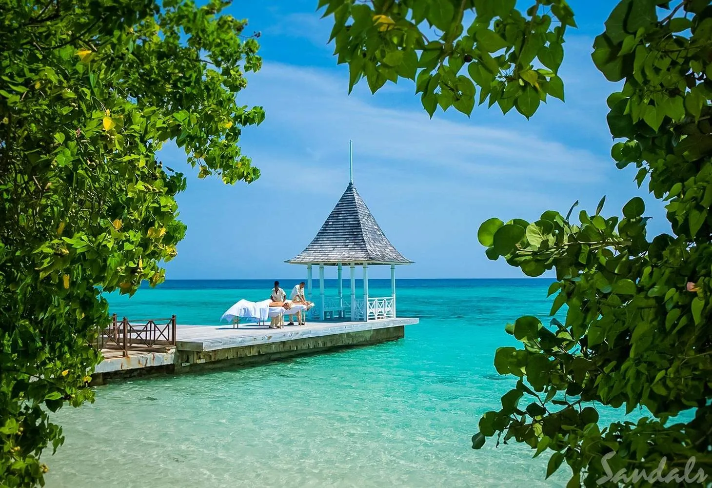 two people getting massage over water