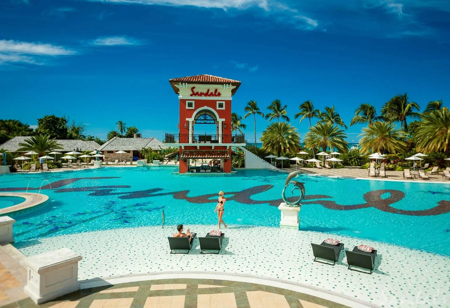pool with beach chairs