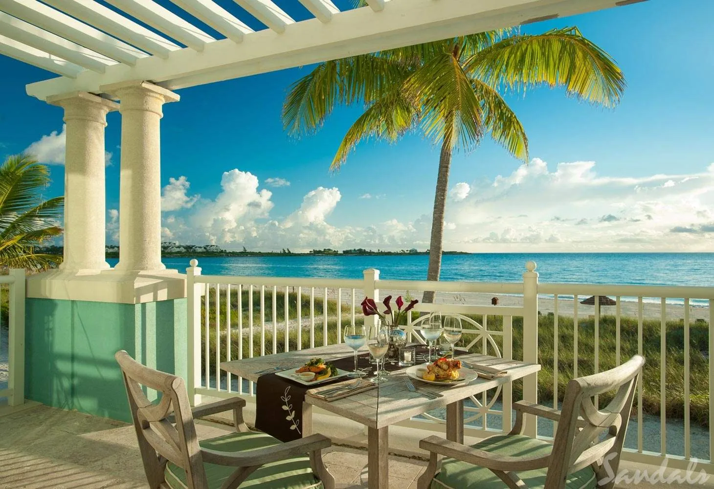 resort patio dinner table in front of ocean