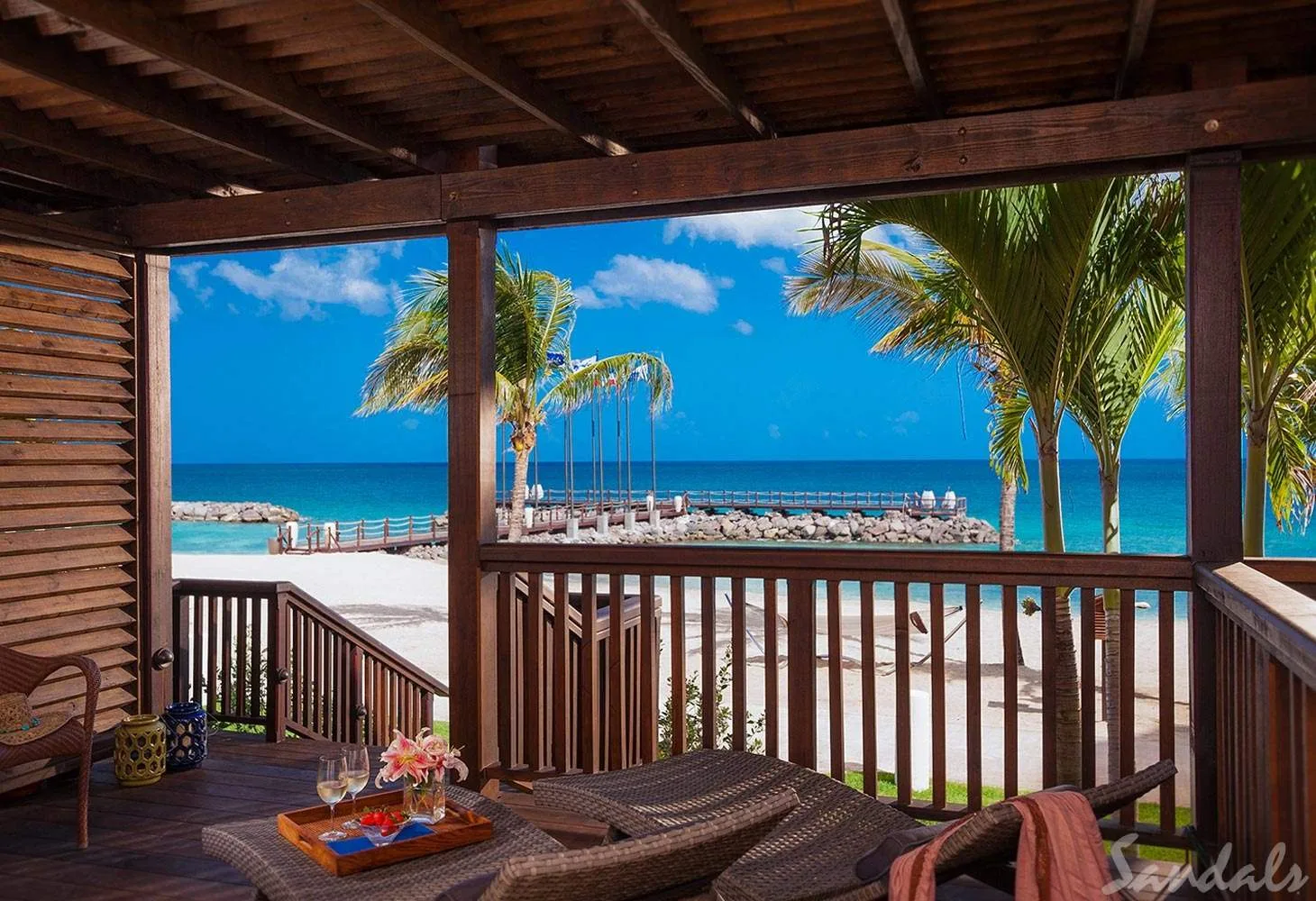 lounge chairs under porch at beach