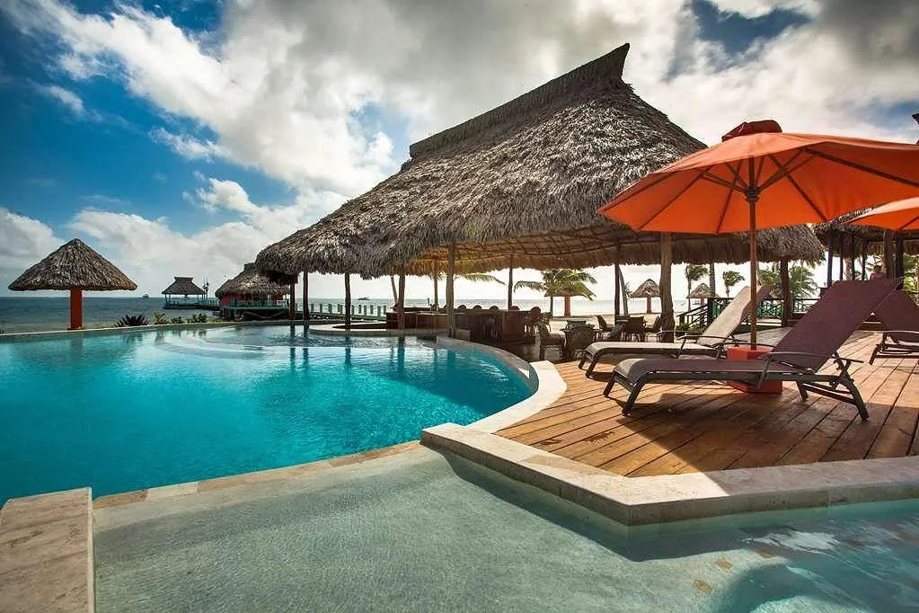 curved resort pool with large covered area