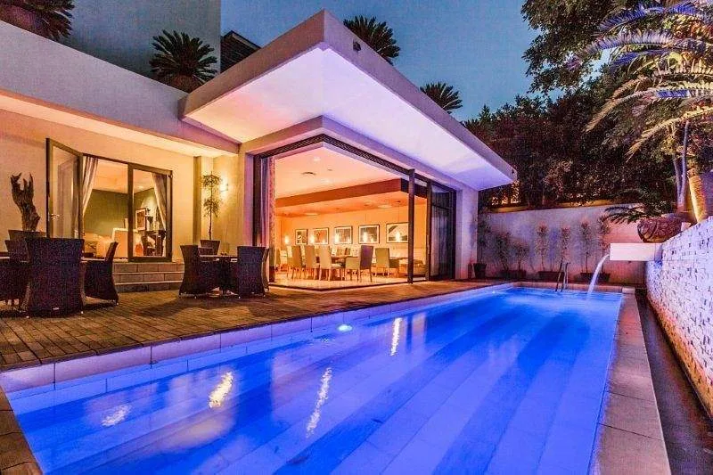 square swimming pool outside resort room