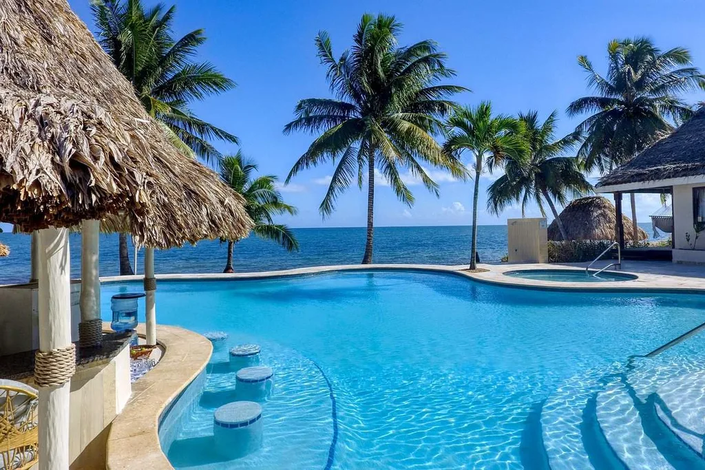 large resort pool with palm trees