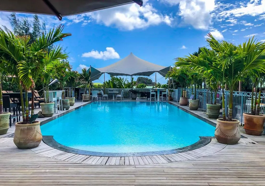 large resort pool with covered bar