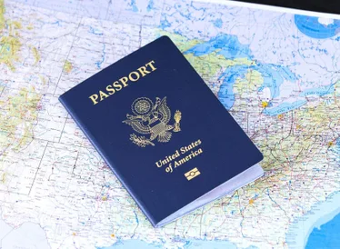 passport on paper map