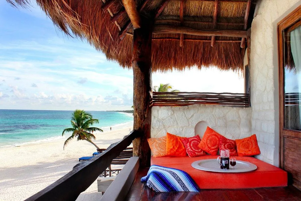 couch under covering on beach