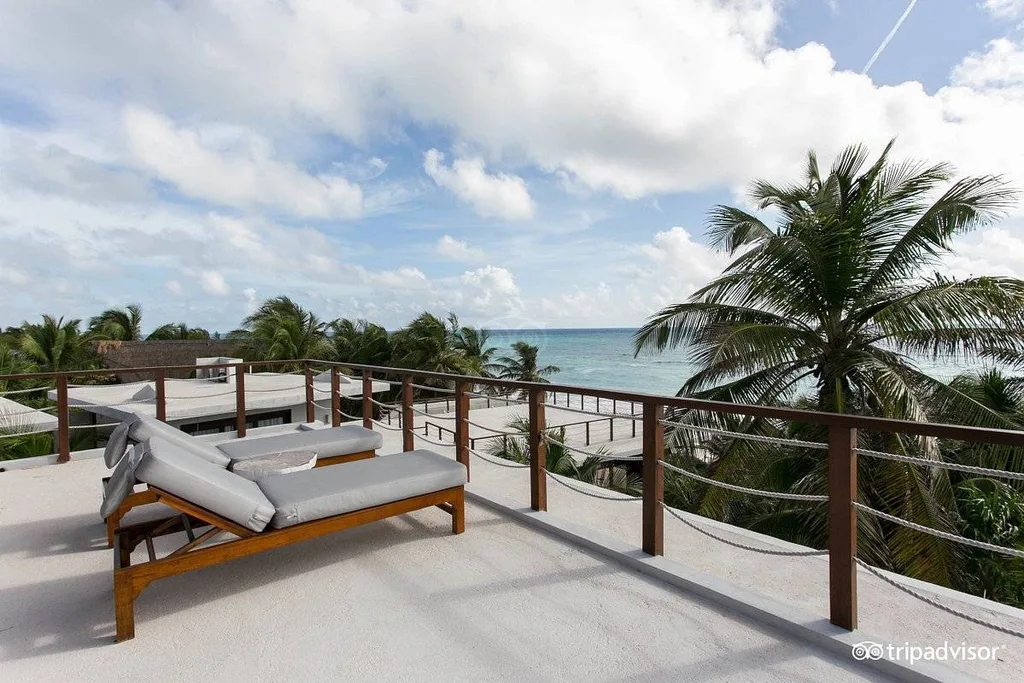two lounge chairs on beach resort patio