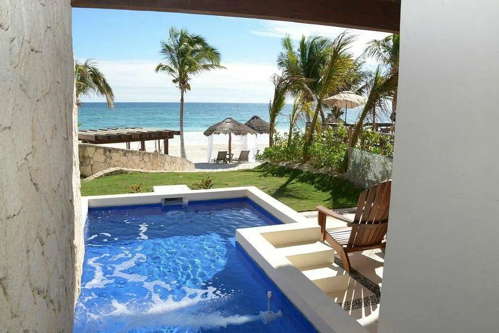 private resort pool facing beach