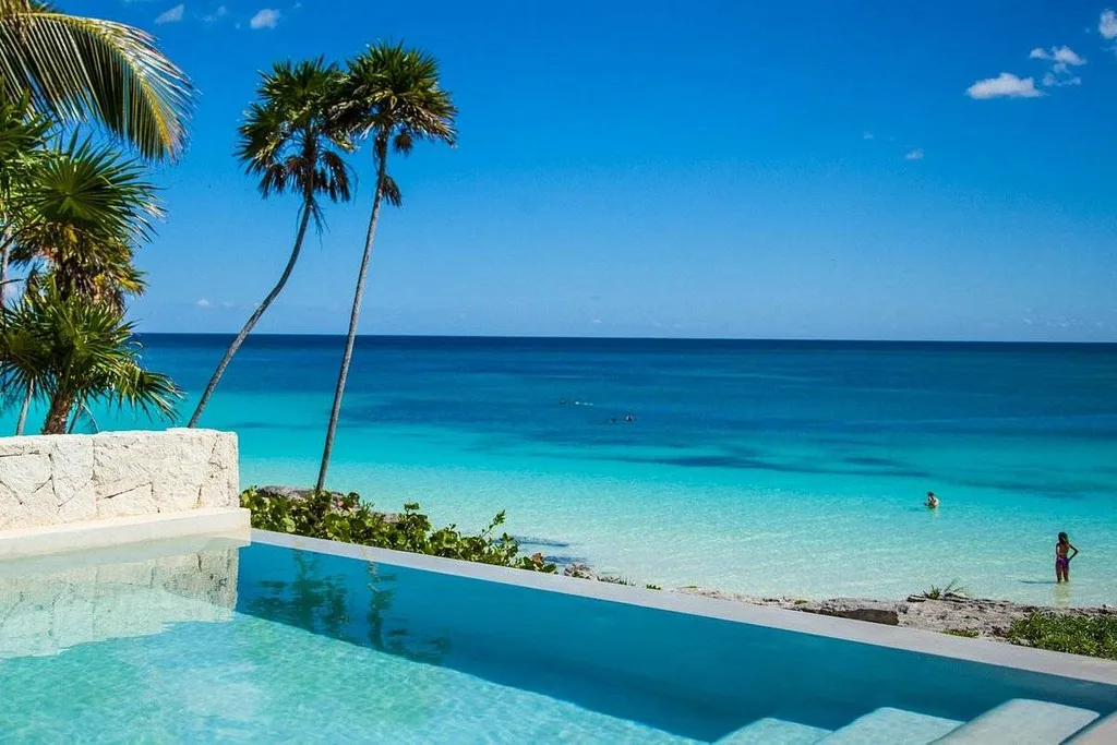 private beach pool with ocean